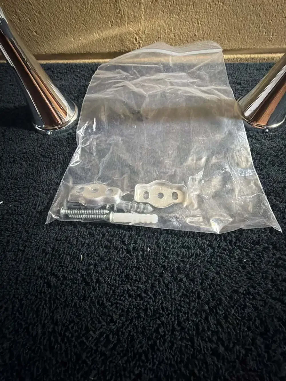 Delta Kayra Pivoting Toilet Paper Holder in Chrome  8”